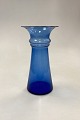 Holmegaard 
Harmony Vase, 
transparent 
blue. Designed 
by Michael Bang 
in 1989. 
Measures 21.6 
cm x ...