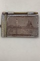 Baltic 
Exhibition 
Malmö silver 
plated notebook 

Worn but in 
good condition, 
with working 
pen, ...