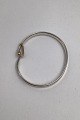 Georg Jensen 
Sterling Silver 
Torun Bangle 
No. 204 (18 Ct 
Gold) 
Measures 
Inside Diam 5.7 
cm ...