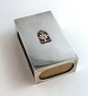 Georg Jensen. 
Large silver 
match holder 
with king's 
mark. Length 10 
cm. Produced 
1945-1951.