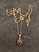 8 carat gold 
pendant 0.8 x 
1.2 cm. and 8 
carat chain 45 
cm. item no. 
616168