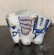 Small faience 
figurine of an 
elephant. 
Designed by 
Jean Grut for 
Aluminia (Royal 
Copenhagen). In 
...
