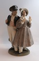 Royal Copenhagen. Porcelain figure. Hans & Trine. Model 1783. Height 24 cm. (2 
quality)