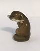 Royal Copenhagen. Porcelain figure. Otter with fish. Model 2333. Height 5 cm. (1 
quality)