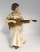 Bing & Grondahl. Porcelain figurine. Woman with guitar. Model 1684. Height 25 
cm. (2 qualty).
