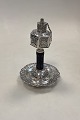 Foreign Oil 
lamp in silver 
with ebony stem 

Used 
condition, 
nicely 
decorated, 
possibly Jewish 
...