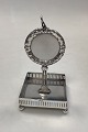 Watch holder in 
silverplating
Wear on the 
surface, but in 
durable 
condition 
Height: 16 cm 
/ ...