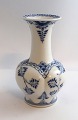 Royal 
Copenhagen. 
Blue fluted, 
half lace. 
Vase. Model ...