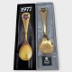 Georg Jensen, 
Spoon of the 
Year, 1977, 
Gold-plated 
Sterling 
Silver, Wood 
violet, 15cm 
long, ...