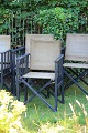Older 
instructor's 
chair in black 
painted wood 
with strong 
natural-colored 
canvas fabric 
with a ...