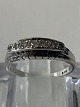 Diamond ring in 
14 carat white 
gold with a 
shiny surface 
and 7 
brilliant-cut 
diamonds
Stamped ...