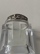 Diamond ring in 
14 carat white 
gold with a 
shiny surface 
and 5 
brilliant-cut 
diamonds
Stamped ...