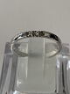Diamond wedding 
ring in 14 
carat white 
gold with a 
shiny surface 
and 2 
brilliant-cut 
...