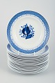 15 plates, 
model number 
11/944. 
Aluminia, 
Tranquebar.
Light blue 
faience with 
dark blue tulip 
...