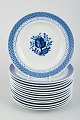 14 plates, 
model number 
11/1842. 
Aluminia, 
Tranquebar.
Light blue 
faience with 
dark blue tulip 
...