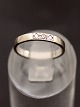 14 carat white 
gold ring size 
48 with 3 
diamonds 
stamped 585 HU 
by goldsmith H. 
Ulriksen ...