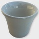 Aluminia, white 
egg cup, height 
4.5cm, some 
cracks under 
the glaze (see 
photo), 
otherwise in 
...