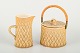 Jens H. 
Quistgaard 
(1919–2008) for 
Bing & Grøndahl 
/ Nissen 
Kronjyden
Relief cream 
jug and ...