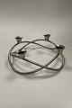 Georg Jensen 
Golden 
Christmas 
Candleholder - 
Advent Crown 
2004.  
Stainless 
steel. Design: 
Maria ...