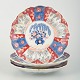 Imari, three 
plates.
Three plates 
from Japan, 
decorated in 
the classic 
Imari style 
with cobalt ...