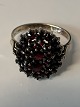 Ladies' ring 
with red 
garnets in 
gold-plated ...