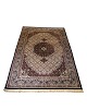 Genuine 
hand-knotted 
oriental rug in 
brownish and 
light shades. 
Classic 
pattern, 
300x200 cm. ...