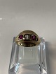 Ladies ring 
with 2 red and 
1 clear stone, 
in 8 carat 
gold.
Stamp: HS HS
Ring size 52, 
...
