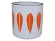Orange enamel 
Lotus tea caddy 
from 
Cathrineholm 
Norway.
The lid is 
missing.
From the ...