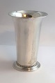 Georg Jensen. 
Sterling silver 
vase hammered. 
Model 107. 
Height 13.5 cm. 
Produced 
1925-1932