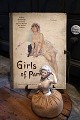Decorative 
French Art Deco 
book cover from 
the 20s with a 
motif of a 
lightly dressed 
woman. ...
