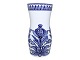 Blue Flower
Rare and tall 
vase with 
unusual 
decoration