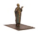 Decorated 
pewter figurine 
in the shape of 
a man on a 
carpet
H: 9,5cm. 
Base: 9x11cm
