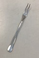 Double-fluted 
Cohr-ABSA 
silver-plated 
Cold Cut fork
Measures 18.8 
cm /7.40 inch