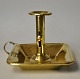 Chamber 
candlestick in 
brass, 19th 
century. With 
handle and drip 
tray. H: 12 cm. 
L: 16 cm. W: 18 
cm.