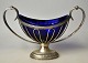 WMF sugar bowl, 
approx. 1900. 
Germany. 
Silver-plated 
silver with 
cobalt blue 
glass insert. 
...