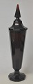 Art deco glass 
lid vase, 
approx. 1930. 
Germany. Red 
glass - 
"garnet" 
colored. 
8-sided foot, 
...
