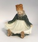 Royal 
Copenhagen. 
Sitting Fanö 
girl. Model 
1315. Height 14 
cm. (2 quality)