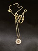 Gold plated 
sterling silver 
daisy pendant 
1.2 cm. from B 
Hertz and gold 
plated sterling 
silver ...