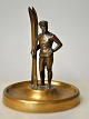 German artist 
(20th century): 
A skier with 
his skis. 
Bronze figure. 
Unsigned. The 
figure stands 
...