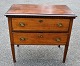 English Louis 
XVI mahogany 
chest of 
drawers, circa 
1780. With 
tapered legs 
and dentils. 
Two ...