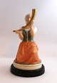 Royal 
Copenhagen. The 
girl with the 
golden horn. 
Model 12242 
Height 21 cm. 
(1 quality)