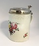Royal 
Copenhagen. 
Lidded mug 
decorated with 
flowers with 
silver lid. Lid 
not stamped. 
Height 17 ...
