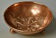 Copper bowl, 
19th century. 
On three ball 
legs. With 
floral 
decoration. H: 
4 cm. Dia: 13 
cm.