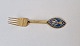 A.Michelsen 
Christmas fork 
in gold-plated 
sterling silver 
and enamel from 
1984
Stamp: ...
