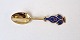 A.Michelsen 
Christmas spoon 
in gold-plated 
sterling silver 
with enamel 
1974
Stamp: 
A.Michelsen ...