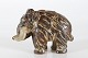Knud Kyhn 
(1880-1969)
Stoneware 
figurine of a 
Mammoth
no. 21839 with 
sung glaze. 
Sign. ...