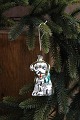 Old Christmas 
tree ornament 
in the shape of 
a small dog in 
glass from 
around 1950. H: 
7cm.