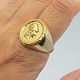 Frantz 
Hingelberg; 
Danish doctoral 
ring of 14k 
gold. Front in 
23k gold with 
motif of 
Minerva ...