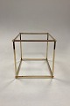 Georg Jensen 
Golden 
Christmas 
Centerpiece for 
Candle Holders. 
Gilded brass. 
Designed by 
...