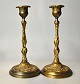 Pair of French 
candlesticks, 
19th century. 
With 
decorations of 
flowers and 
twists. On a 
round ...